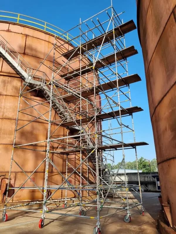 Scaffolding erected around a bulk storage tank